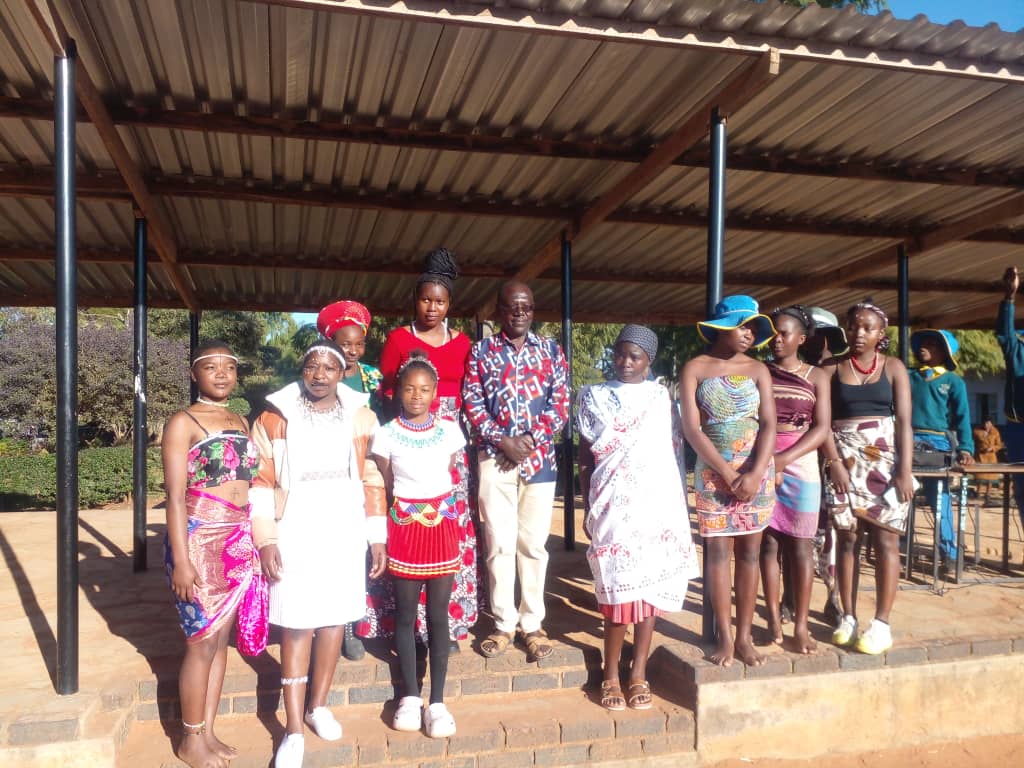 Students in traditional attire celebrating Culture Day.